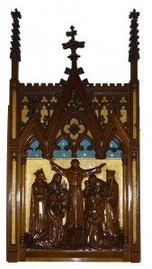 Deel van het altaarretabel dat thans in de toegang naar de kapel hangt